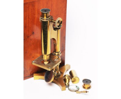 A brass microscope by R & J Beck London & Philadelphia 10799 in teak box