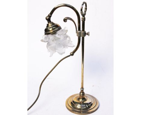 An adjustable brass lamp with glass frosted glass shade, height 45cm. Condition - wear to metal, no chips or cracks to shade.
