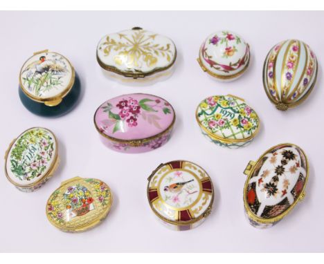 A group of ten porcelain/enamel trinket boxes. Condition - very good, general wear only.