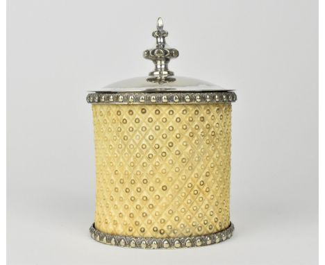 A Victorian silver plated and ivory tea caddy, of oval form with egg and dart mounts, the hinged lid above a lattice carved b