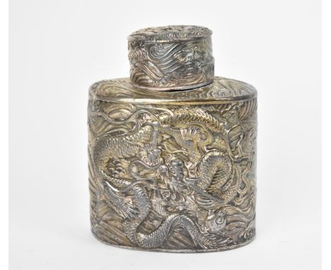 A Chinese export metal tea caddy, extensively decorated with two dragons and flaming pearl over the sea, 11.5 cm high x 10 cm