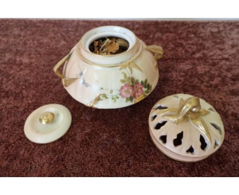 Royal Worcester potpourri holder with pierced lift off lid  and further solid lid, with twin handles and floral detail No.132