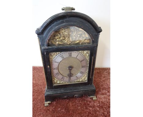 19th C single fusee bracket clock in ebonised arch top case with brass and steel dial and portico with glazed panels to the s