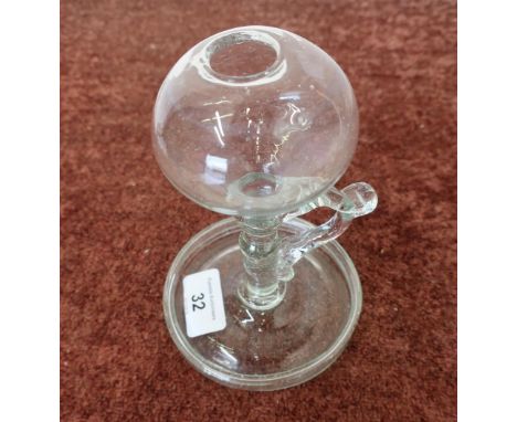 Small Georgian glass lace makers oil lamp with circular base, loop handle, and small flattened globe (height 15.5cm) 