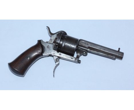 A Lefaucheux Pinfire revolver, with 3' octagonal barrel, integral clearing rod and hinged loading gate, folding trigger and w