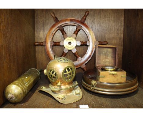 A miniature copper replica of a Diver's helmet, approximately 17cm high, together with a small brass compass on gimbal mount 