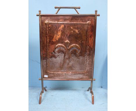 An Arts & Crafts copper firescreen together with a heavy copper coal bucket and pair of brass-mounted bellows (3)