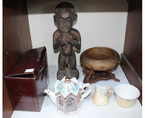 SECTION 19.  An African fertility carved wood figure together with a wooden carved elephant bowl, Sadler teapot and a Royal W