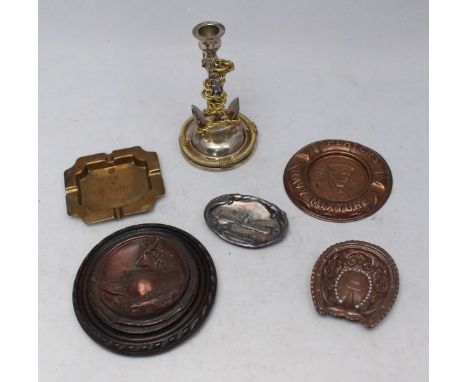 A copper horseshoe dish pressed from copper rivets from the HMS Foudroyant, together with various Naval related metal dishes 