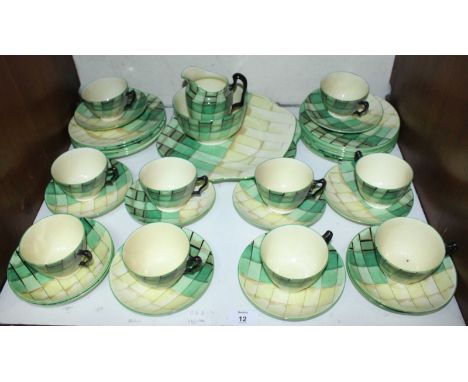 SECTION 12.  A Crown Staffordshire tea set decorated with green and yellow patchwork pattern, comprising 10 cups & saucers, 1