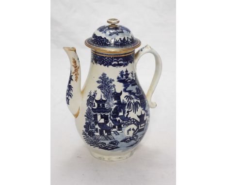 An 18th Century Caughley Porcelain baluster coffee pot and dome cover, printed in underglaze cobalt blue with a willow 'type'