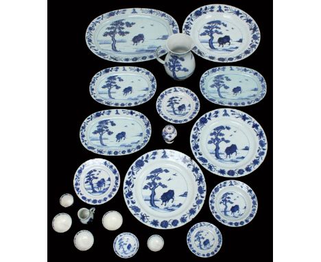 "A Rare Early 18th Century Chinese Armorial Porcelain part dinner service of twenty pieces, each piece painted in underglaze 