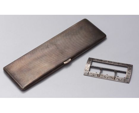 A silver cigarette case, engine turned decoration, Birmingham, 1935, maker's mark of Beddoes & Co and a silver belt buckle, B