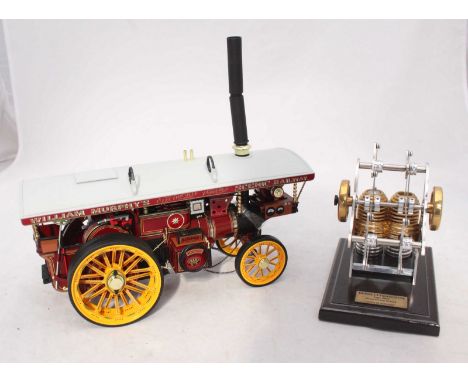 A German static steam engine HB32 Sterling Seit 1990, made by Bohm, 15x30cm, together with a model of William Murphy's Scenic