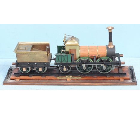 A well engineered 5" gauge model of the Liverpool & Manchester Lion 0-4-2 locomotive Titfield Thunderbolt, the engine clad in