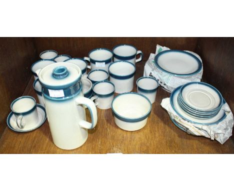 SECTION 34. A thirty-two piece Wedgwood ceramic 'Blue Pacific' tea and coffee service comprising of a coffee pot, coffee cans
