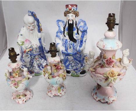 SECTION 5.  A large Italian lamp modelled with putti and flowers, approximately 39cm together with a matching pair of smaller