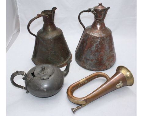 An Indian Kumaon regiment bugle, together with two large copper haystack jugs and a pewter teapot