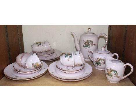 SECTION 29.  A Japanese Koran demitasse coffee set in pink with hand-painted green and gilt dragons, comprising coffee jug, m