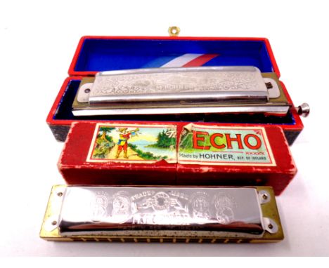 A boxed Hohner Super Chromonica together with a further Echo harmonica, both parts boxed  