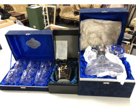 A set of six Glen Cairn Q.E. II lead crystal whisky glasses, decanter and a Q.E. II ceramic malt whisky decanter (all parts b
