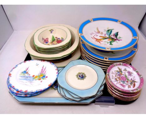 A tray containing a quantity of continental porcelain blue and gilt dessert plates, other English porcelain plates including 