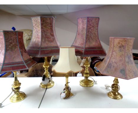 Two pairs of brass table lamps with shades together with a further brass table lamp with shade  