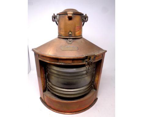 A copper ship's 'Babord' lamp 