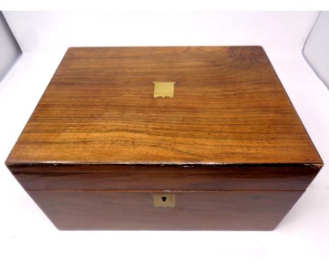 A 19th century mahogany travelling writing box with inkwell 
