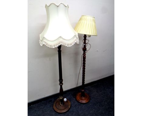 A beech wood barley twist standard lamp and shade and a further lamp with tasseled shade 