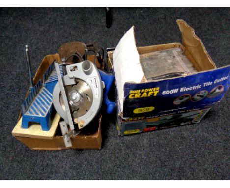 A Powercraft 600 W electric tile cutter, boxed, together with a further box containing hand saw, miter saw etc  