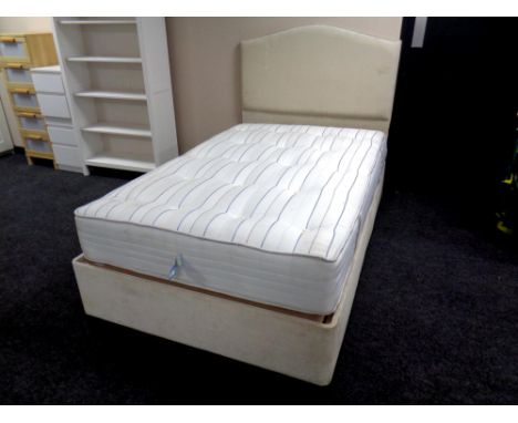 A 4' electric divan and interior with padded headboard 