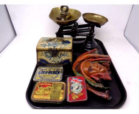 A tray containing a set of Librasco kitchen scales with weights, vintage tins by Jacobs, log cabin gold leaf, together with a