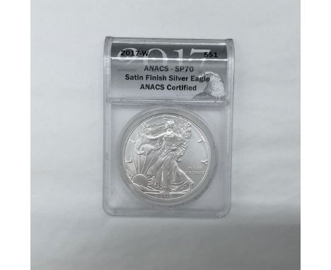 West Point Mint. Satin Finish. The obverse side depicts Liberty in full stride. She is shown wrapped in the flag, her right h