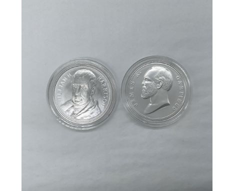 A collection of two 1 troy ounce silver medals. The collection includes William Harrison the 9th US President: the obverse si