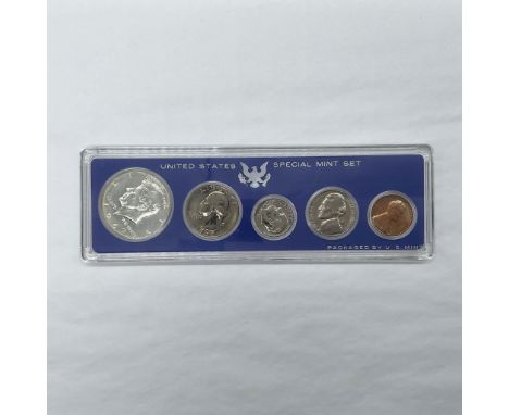 Collection includes a Lincoln Cent, a Jefferson Nickel, a Roosevelt Dime, a Washington Quarter, and a Kennedy Half Dollar. Th