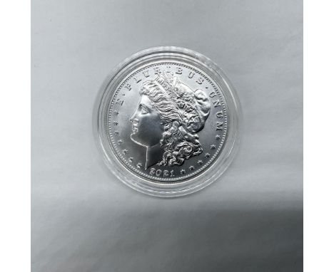New Orleans Mint. The obverse side features Liberty in profile. She is shown in cap, flora, and crown. The reverse side depic