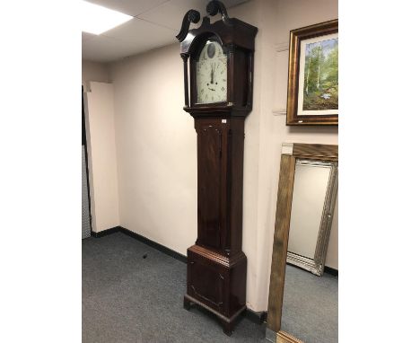 A George III mahogany eight day longcase clock with painted dial indistinctly signed, height 228 cm.