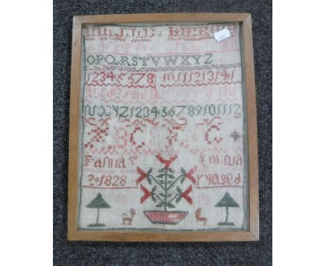 A George IV framed alphabet sampler dated 1828