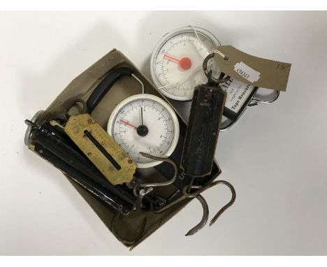 A box of four vintage pocket scales and two luggage scales 
