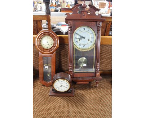 A Highlands 31 day wall clock together with a 31 day regulator clock and Comitti of London mantel clock