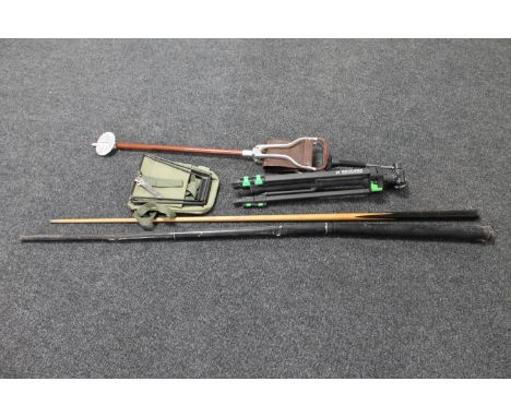 A Thurston &amp; Company snooker cue in case, camera tripod, shooting stick and a folding chair in carry bag 