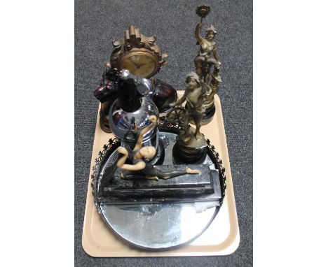 A contemporary mirrored tray together with a contemporary figural lion mantel clock, pair of spelter figures, soda siphon and