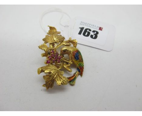 A Vintage Cocktail Brooch, as an exotic bird on a fruiting vine, with claw set highlights and enamel detail, stamped "750". 