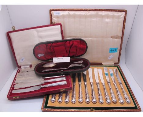 A Set of Twelve Hallmarked Silver Handled Tea Knives, in original fitted case; together with a cased set of six hallmarked si