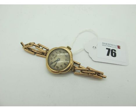 Rolex; A Vintage 9ct Gold Cased Ladies Wristwatch, the signed dial with Arabic numerals, the movement stamped "Rolex", within