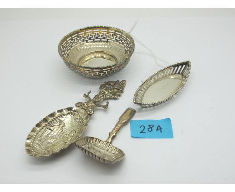 A Hallmarked Silver Caddy Spoon, I.T(?), Birmingham 1822, the rounded rectangular bowl detailed with fruit; Together with A L