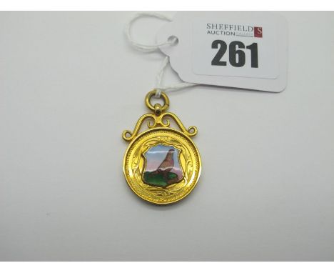 A 9ct Gold Medallion Pendant, detailed with a pigeon in enamel. 