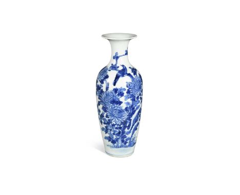 A Chinese blue and white porcelain vase, Qing Dynasty, 19th century  decorated with flowering blossoms, rockwork and birds, s