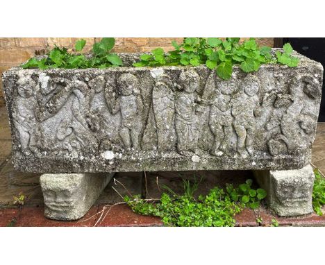 A stone trough or planter, probably 19th century,  of rectangular form, the front with relief scene depicting the expulsion f